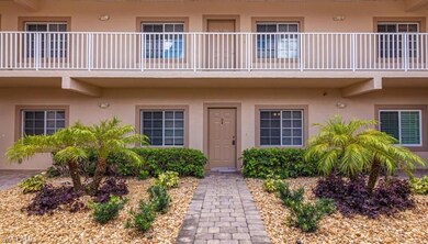 View of exterior entry featuring stucco siding