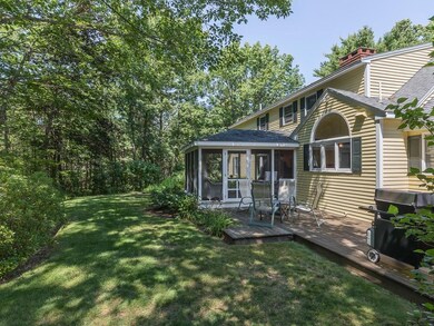 A rear view of the home shows the...