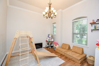 Formal dining room, currently being used as a play