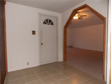 FOYER WITH CERAMIC TILE FLOOR
