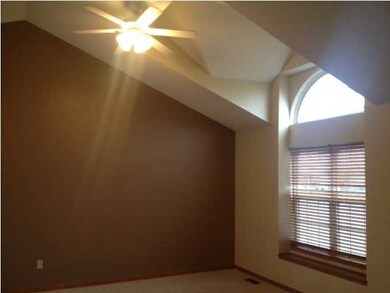 Vaulted ceiling in living room.