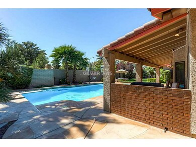 Exterior Back. Covered Patio with outdoor BBQ