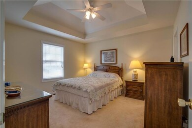 Master bedroom offers double trey ceiling, and huge walk-in closet
