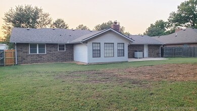 Vinyl sided family room addition on back. White do