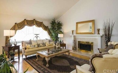 Luxurious living room features high ceiling, Maple