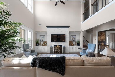 Living room featuring plenty of natural light, a h