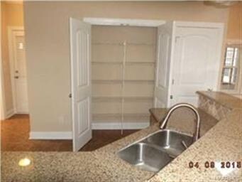 Kitchen has plenty of cabinet space and a double d