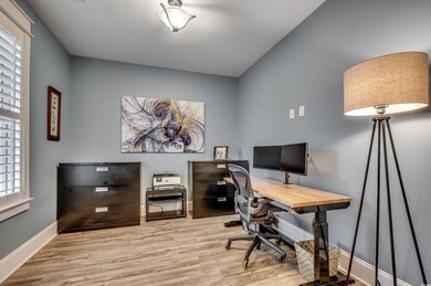 Office area featuring light hardwood / wood-style 