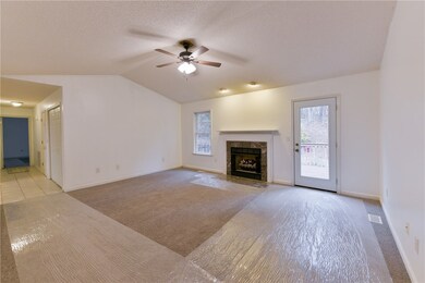 Family room with cathedral ceiling and access to d