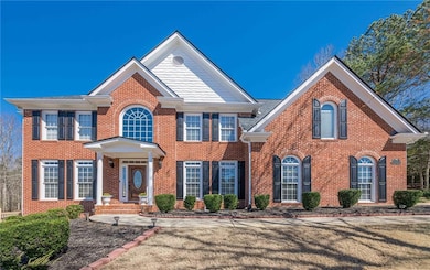 View of front of home with brick siding and a fron