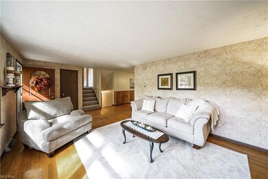 Large living room with hardwood floors.