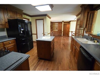 Kitchen looking into family room & breakfast nook