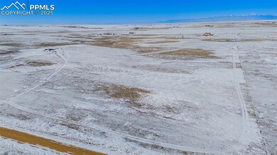 Snowy aerial view with a mountain view