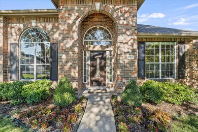 Stunning curb appeal beckons you into this amazing