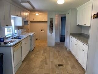 NEW KITCHEN CABINETS. GRANITE TOPS, FAUCETS & LIGH
