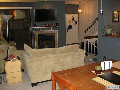 another view of the living room, looking back towa