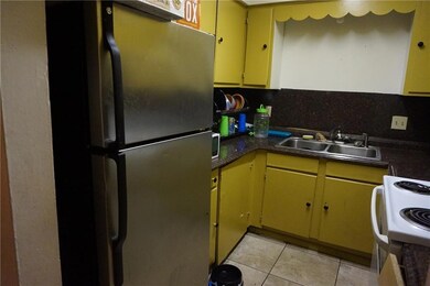 Unit B's Kitchen offers Refrigerator and electric