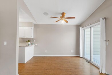 Adjoining dining area with patio-door access to the upper deck