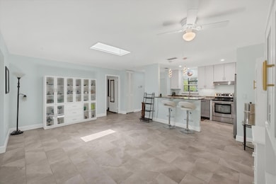 VIEW LIVING ROOM TOWARD KITCHEN