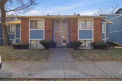 View of front of property with brick siding