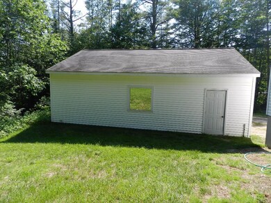 Side view of the garage (there is...