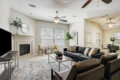 Living room with gas-log fireplace.