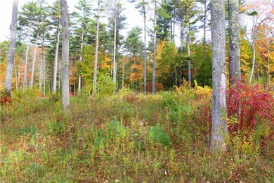 Lot #7 is only lightly wooded with...