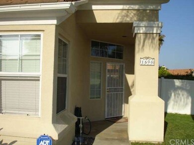 Front walk with entryway into the living room.