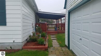 6465 M 55, Whittemore, MI 48770 - photo 3