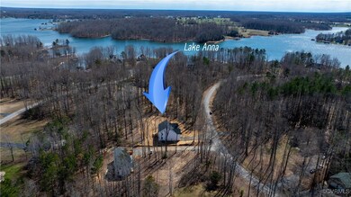 Drone / aerial view featuring a water view and a v