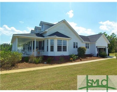 Exterior Front. Fresh landscaping accents the surr