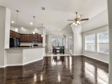 Kitchen with a wealth of natural light, lofted cei