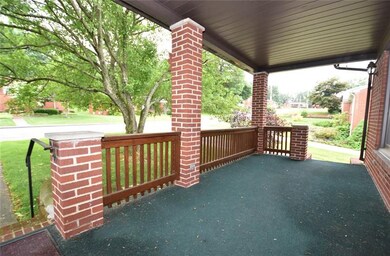 The awesome covered front porch is a great place t