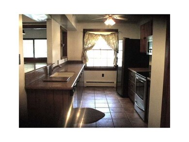 Kitchen. Kitchen with pine cabinets, corian counte