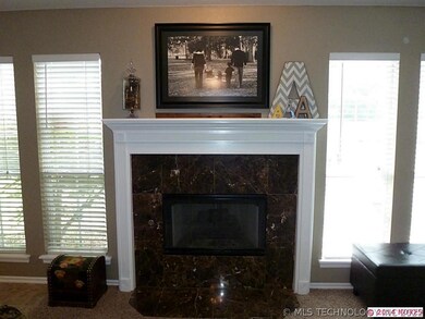 Gorgeous fireplace with gas logs.