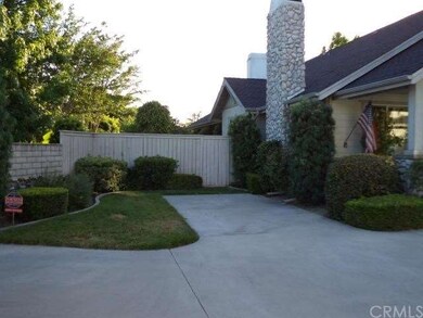 Additional parking space on side of home