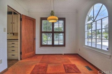 Breakfast nook with entry to kitchen on left.
