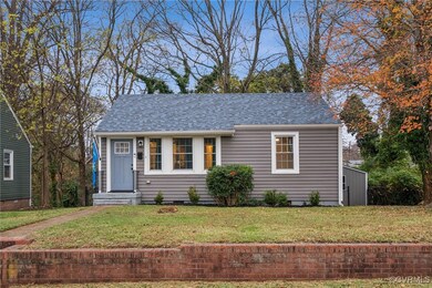 View of front of property featuring a front yard