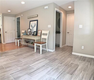 Front entryway with access to garage...