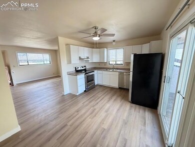 Kitchen featuring appliances with stainless steel 