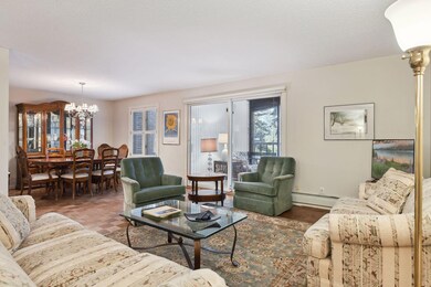 The Great Room is open to the Dining Room and to the three season porch.  The heating element has been remodeled to allow for a continuous flat floor into the porch.