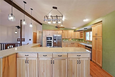 Upgraded Kitchen with beautiful hickory cabinets -
