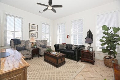 Living room view just off the stairs with tons of