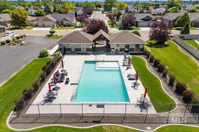 Aerial view of residential area with a pool