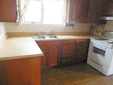 Kitchen. Behind this comforting traditional style 