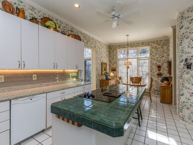 Updated kitchen with granite and subway tile