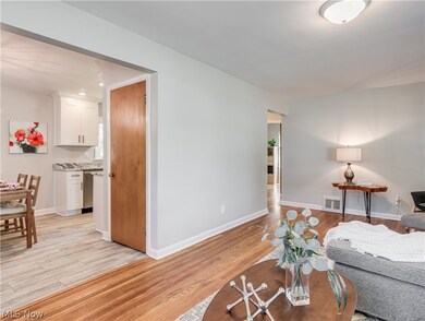 Living Room with View of Eat-In Kitchen