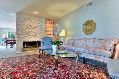 The Formal Living Room has a white washed stone fi