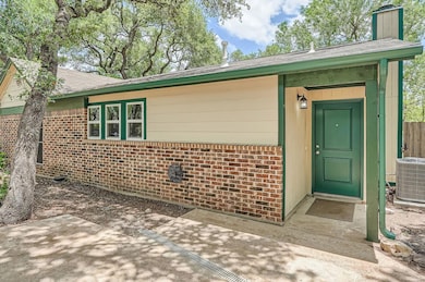 Doorway to property with central air condition un