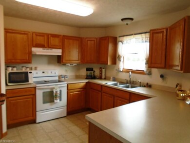 The massive kitchen offers all of the appliances, 